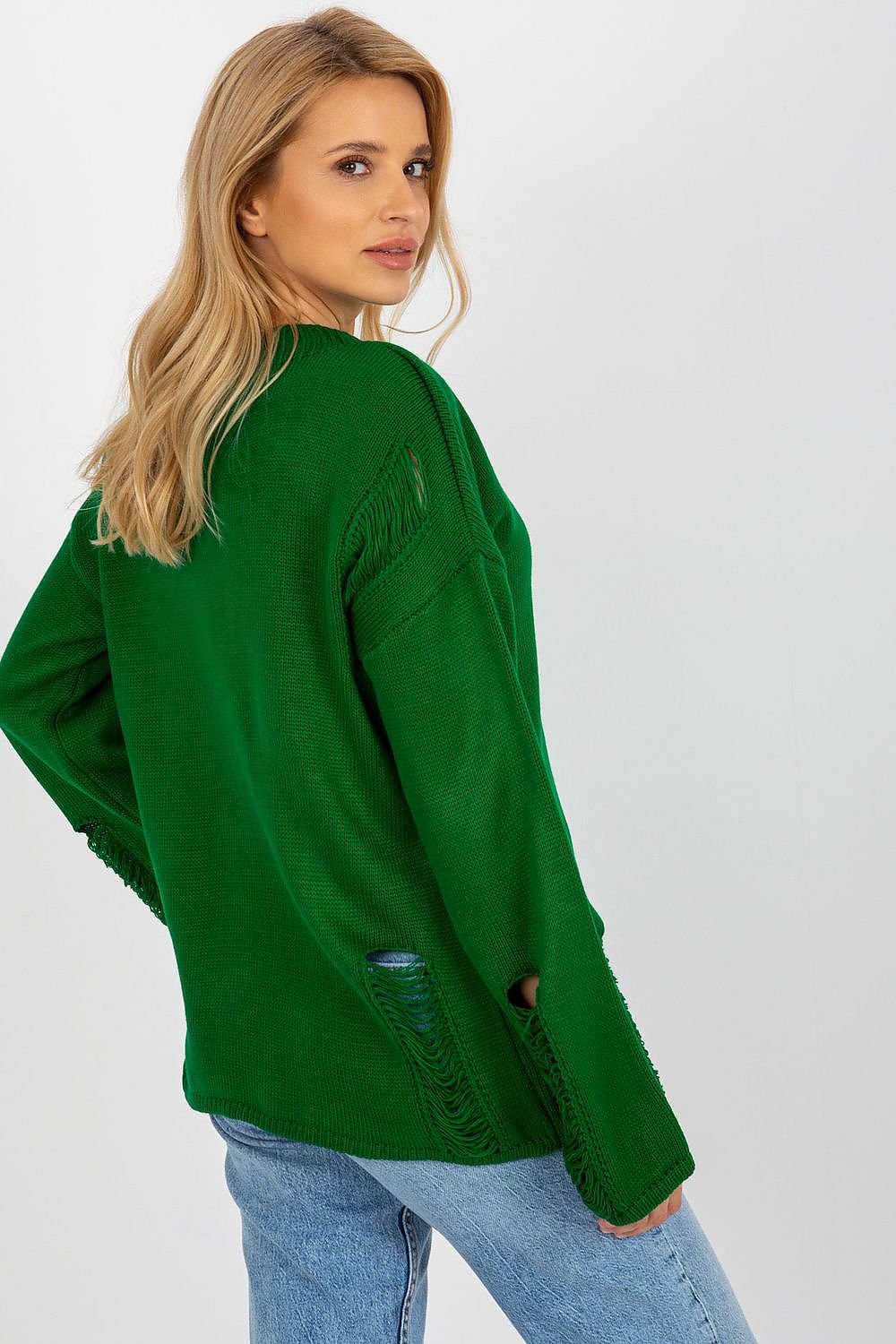 Stylish green jumper with long sleeves and youthful appeal, showcased on a blonde female model against a plain white background.