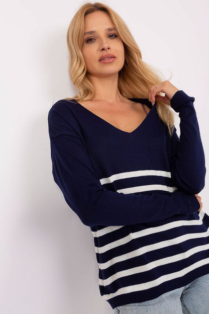 Cozy navy blue striped jumper with V-neck design, showcasing fashionable, casual style.