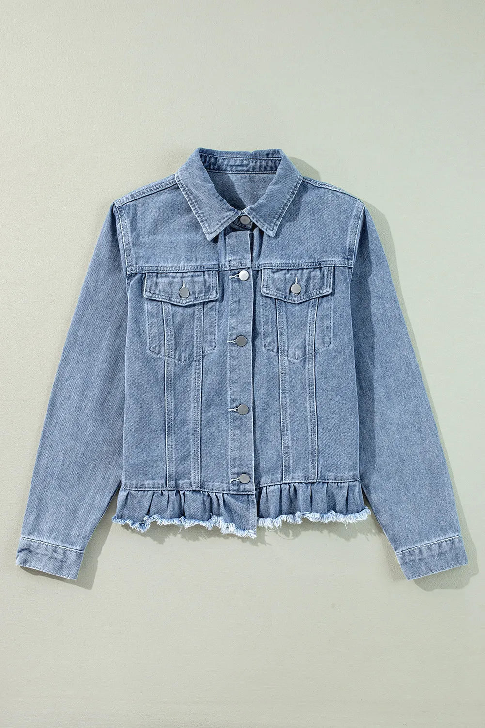 Raw Hem Long Sleeve Denim Jacket
A distressed denim jacket with frayed edges, featuring a classic collar, button closure, and front pockets for a casual yet stylish look.