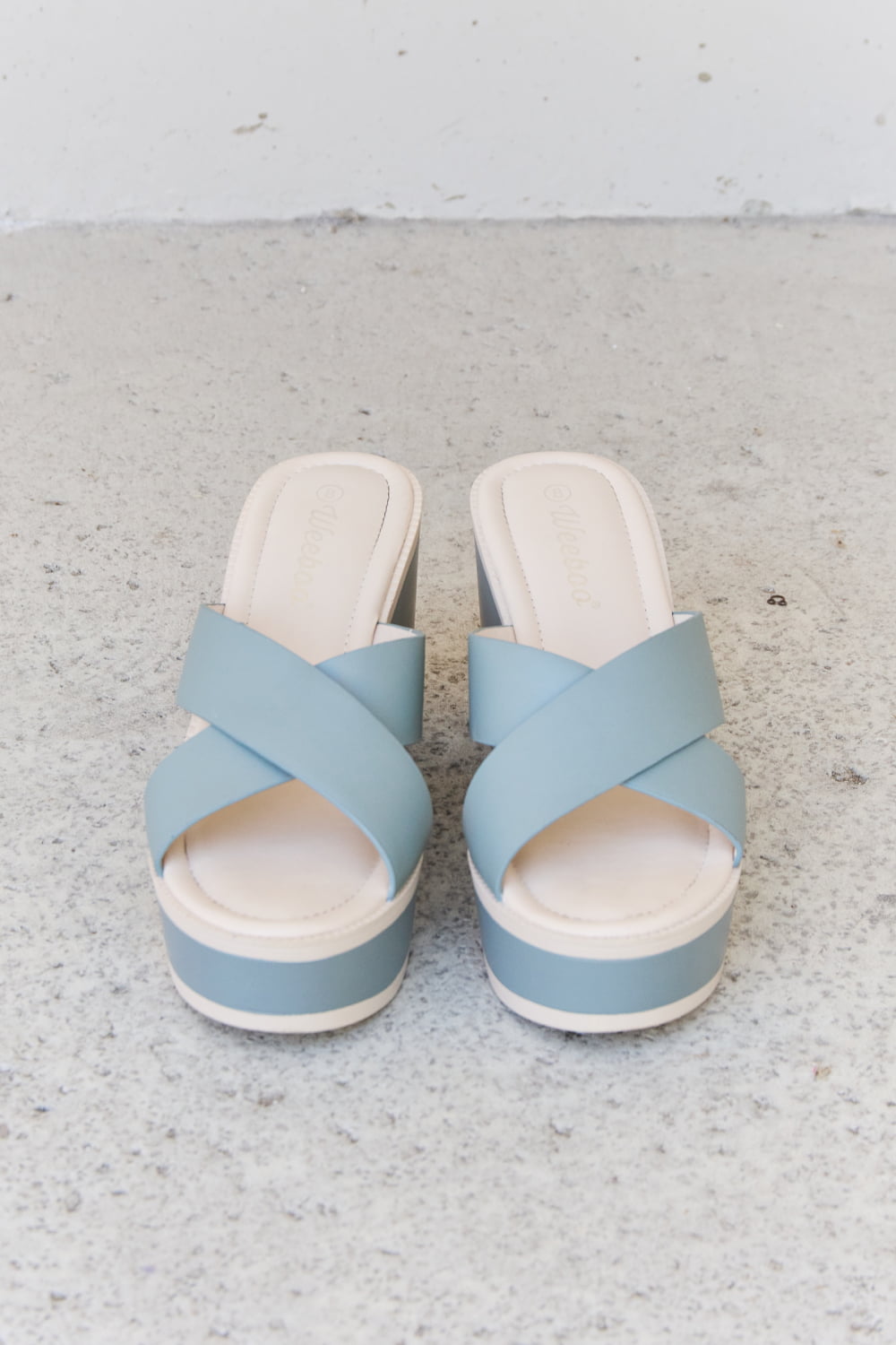 Misty blue platform sandals with contrasting straps and a comfortable design for casual, stylish wear.