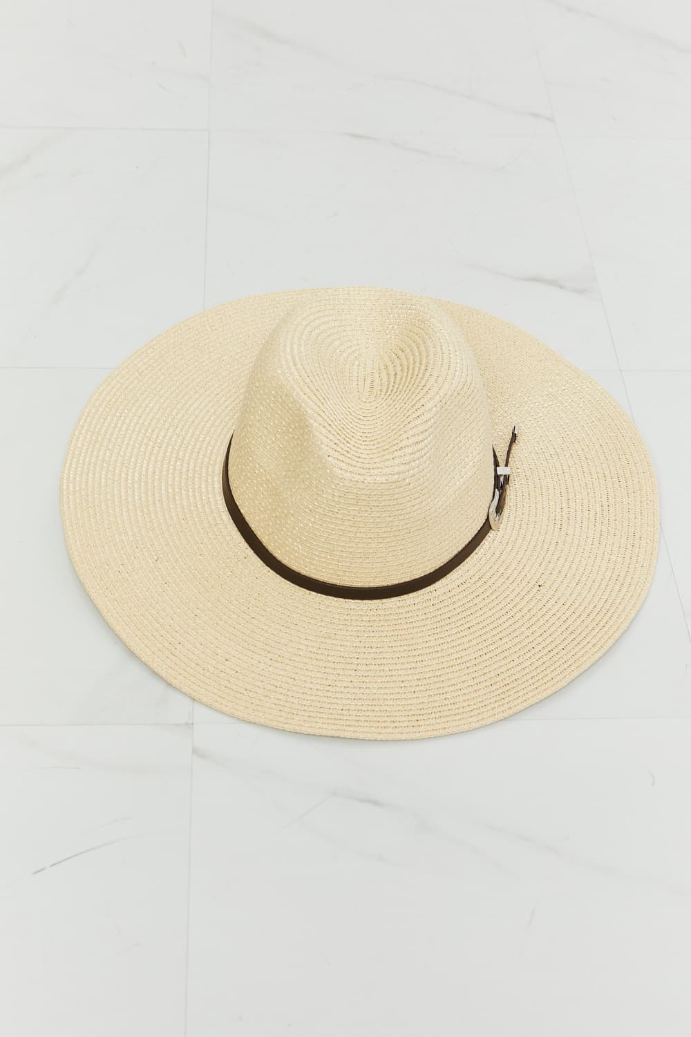 Versatile Straw Fedora Hat - Elegant summer accessory for fashionable women.