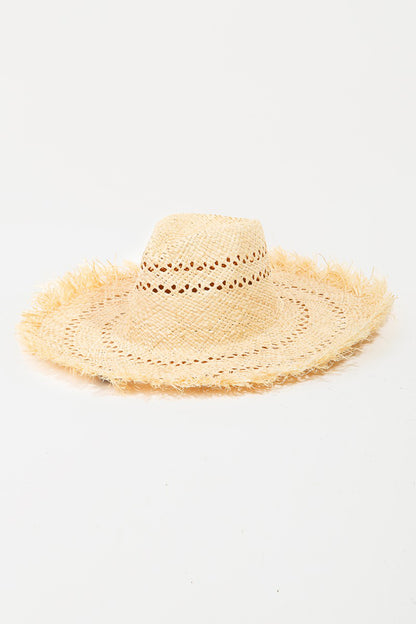 Chic straw sun hat with fringed trim and openwork design, perfect for casual summer style.