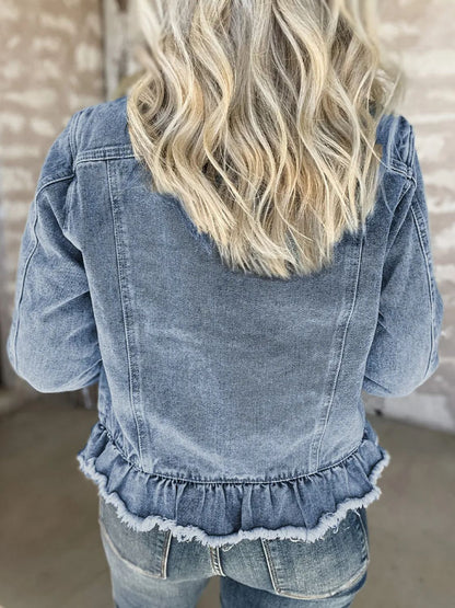 Wavy blonde hair, raw hem denim jacket with ruffle detail