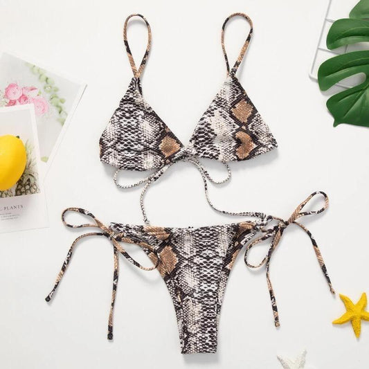 Stylish snake-print bikini set with triangle top and cheeky bottom, featuring adjustable tie-side details for a perfect fit. The exotic pattern and neutral tones create a modern and sophisticated look.