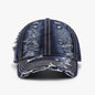 Distressed Adjustable Cotton Baseball Cap
A navy blue baseball cap with a worn, distressed appearance is featured in the image. The cap has a structured shape and an adjustable strap at the back for a customized fit. The textured fabric and visible stitching create a rugged, vintage-inspired look.