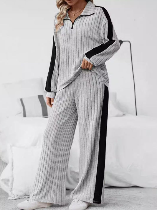 Cozy ribbed knit top and pants set with sporty contrast stripes for stylish loungewear.