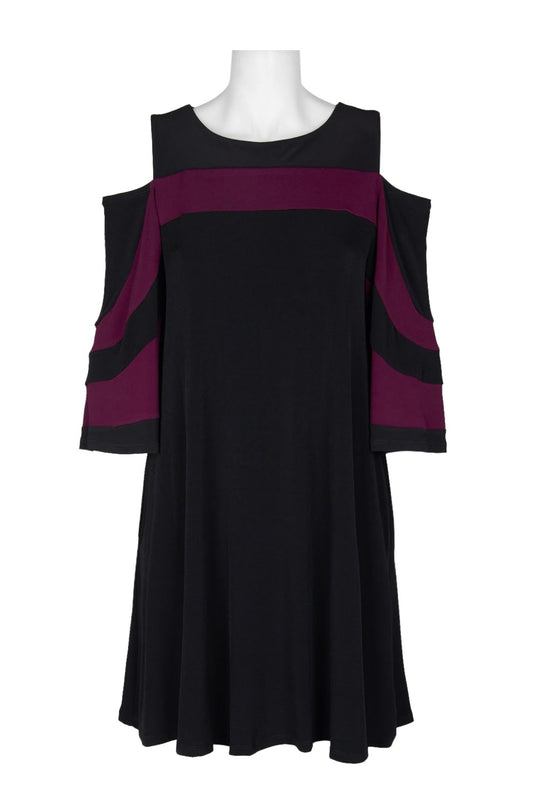 Elegant cold-shoulder dress with boat neck and long sleeves. Color-blocked design in black and burgundy. Stylish and versatile women's clothing.