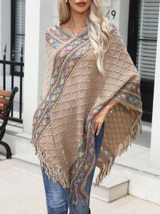 Lilghtweaight ladies poncho with pastel rainbow colour accent; and fringe hem 